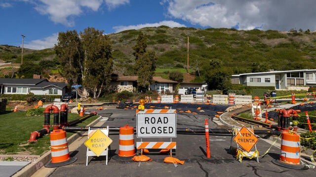 The road is closed to traffic on Exultant Dr. 