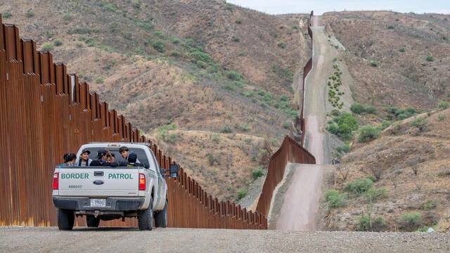 U.S. Border Patrol Takes Immigrants Into Custody At Arizona-Mexico Border 
